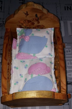 Le petit lit de poupée